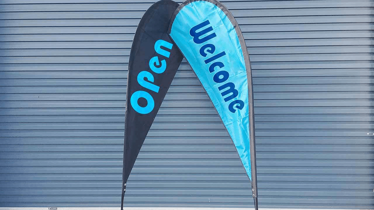 All you need to know about using wholesale feather flags to build brand awareness